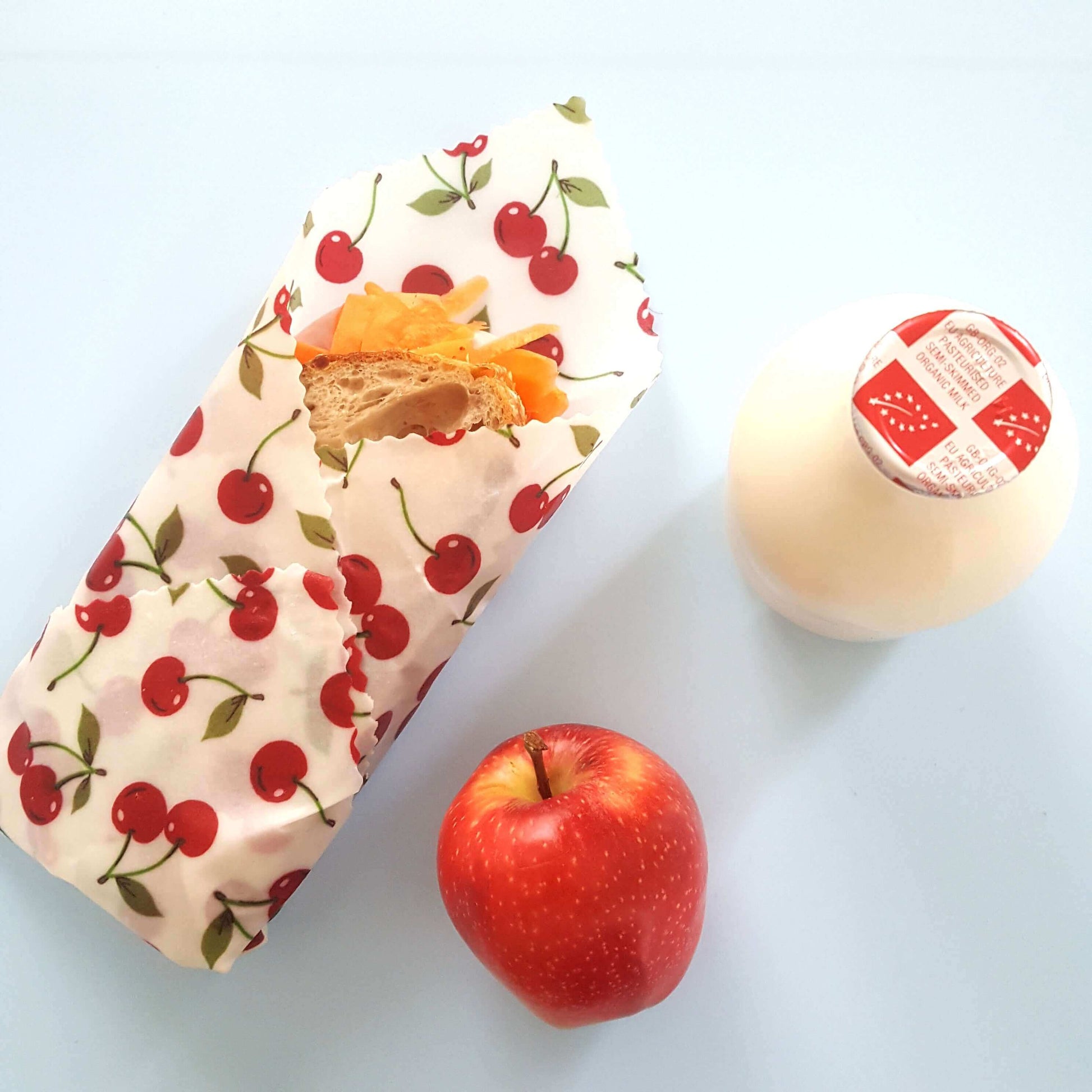 Planet-Kind single large beeswax wrap in Cherries pattern as flatlay