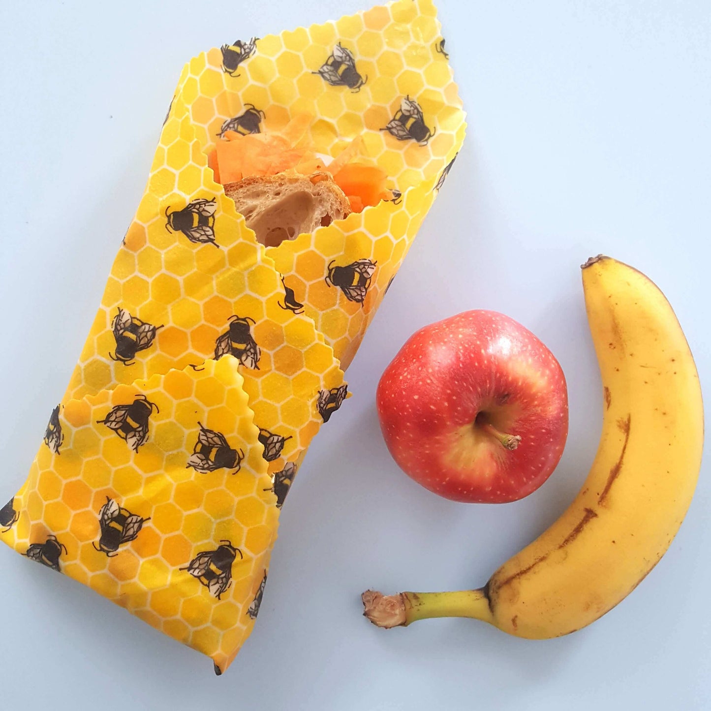 Planet-Kind single large beeswax wrap in Yellow Bees pattern as flatlay