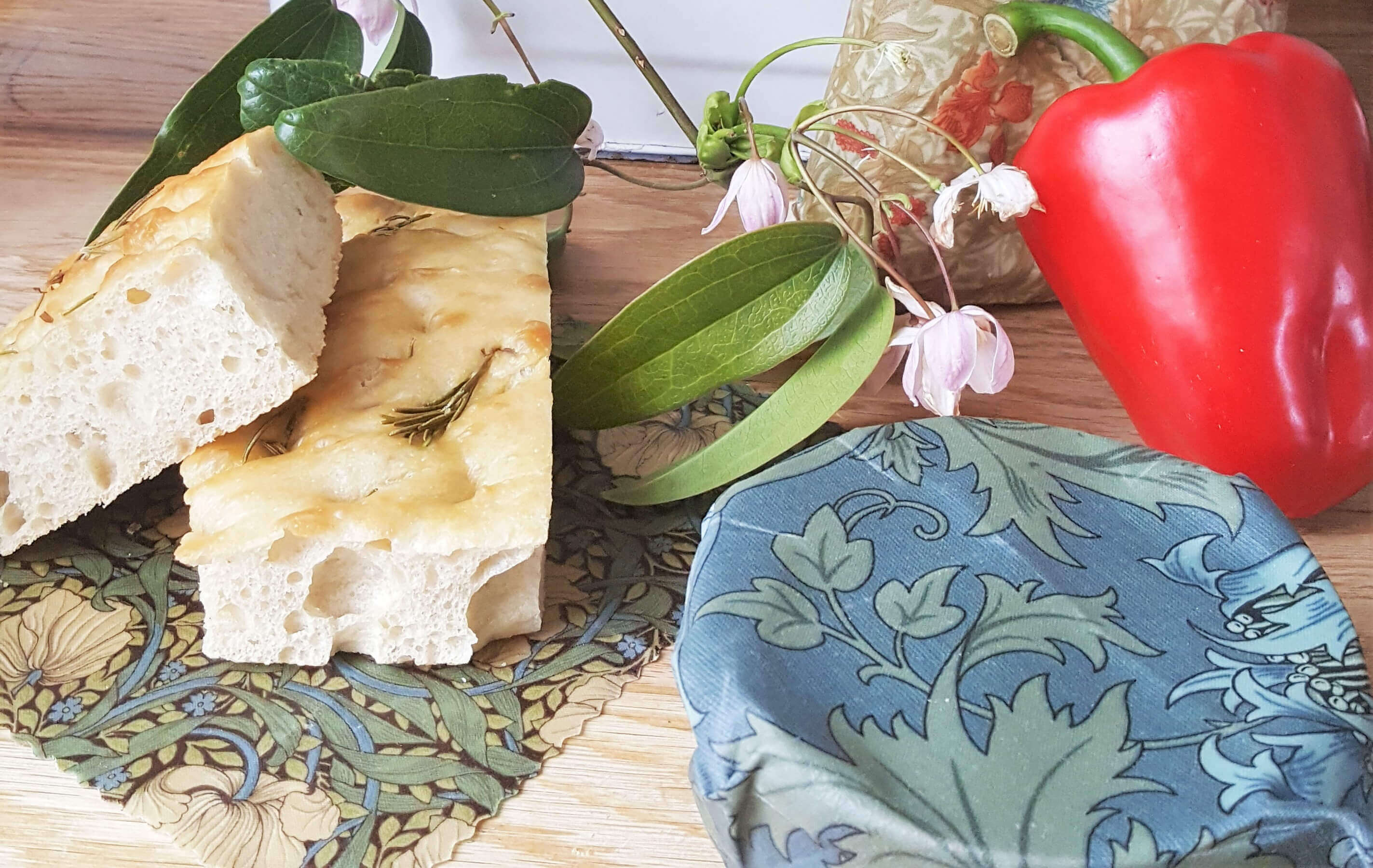 Beeswax wraps that are certified food safe and used for food flatlay in William Morris Iris pattern