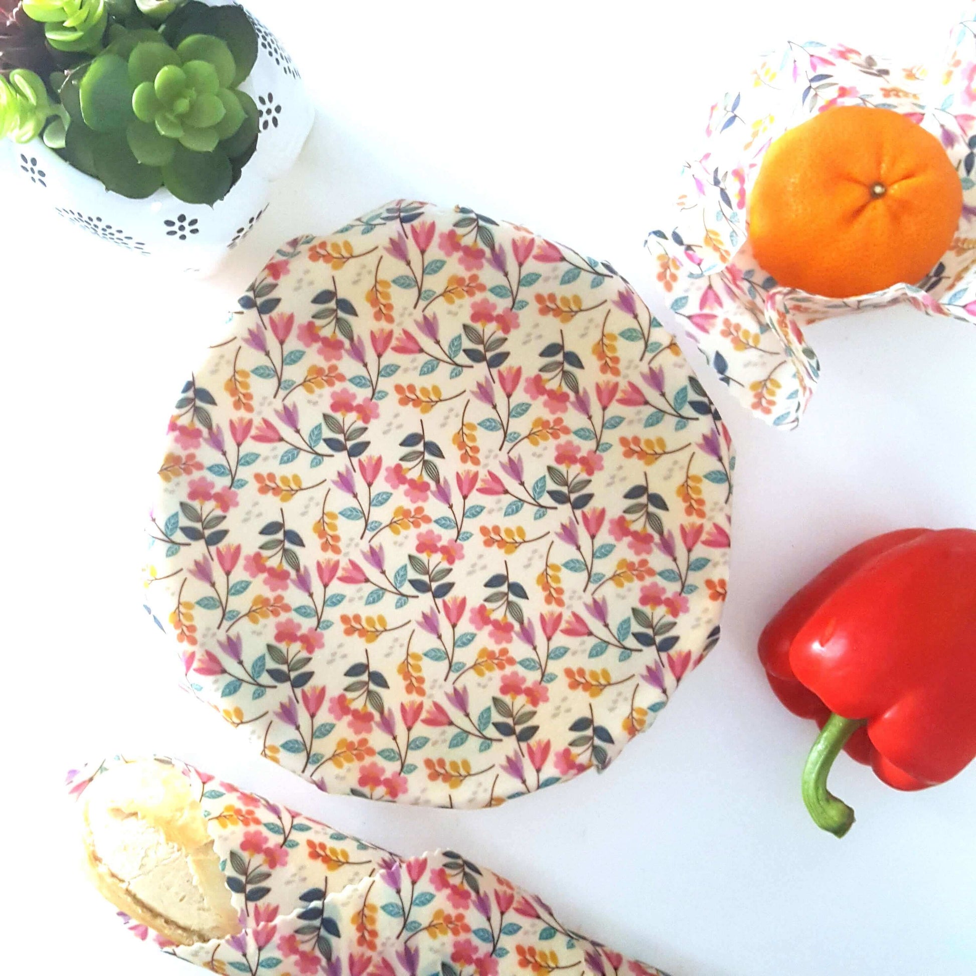 Reusable Beeswax Food Wraps 100% Hand Made in the UK by Honey Bee Good shown in Classic Set of 3 Meadow flatlay