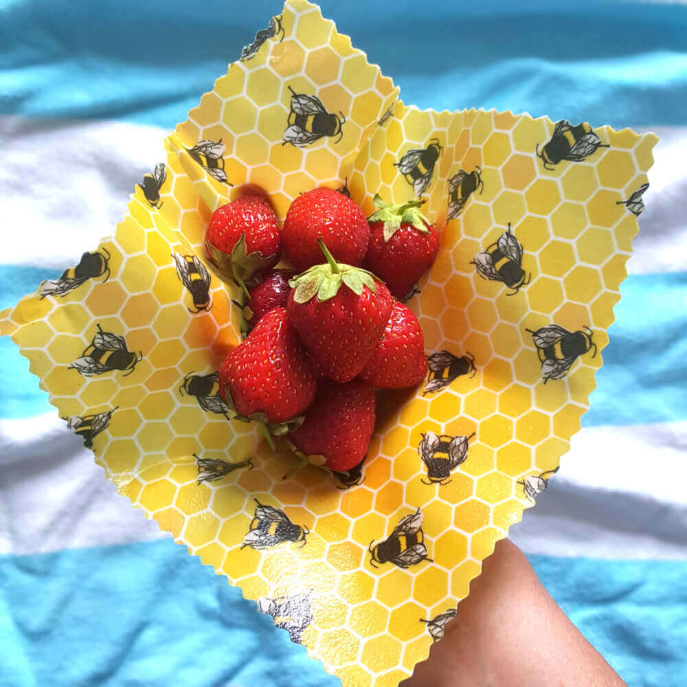 Reusable Beeswax Food Wraps 100% Hand Made in the UK by Honey Bee Good. Earth Kind Classic Yellow bees with strawberries