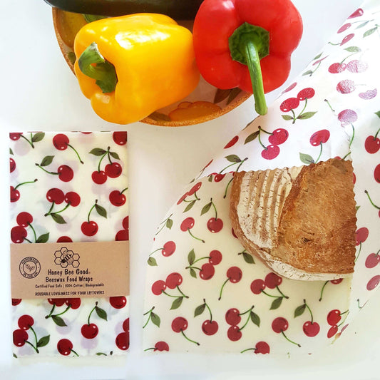 Reusable Beeswax Food Wraps 100% Hand Made in the UK by Honey Bee Good shown in Classic XXL Bread Wrap cherries