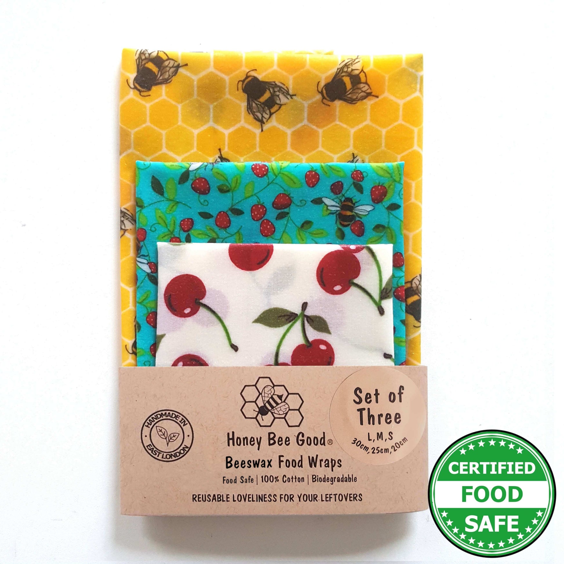 Reusable Beeswax Food Wraps 100% Hand Made in the UK by Honey Bee Good shown in Set of 3 Classic Bees & Cherries