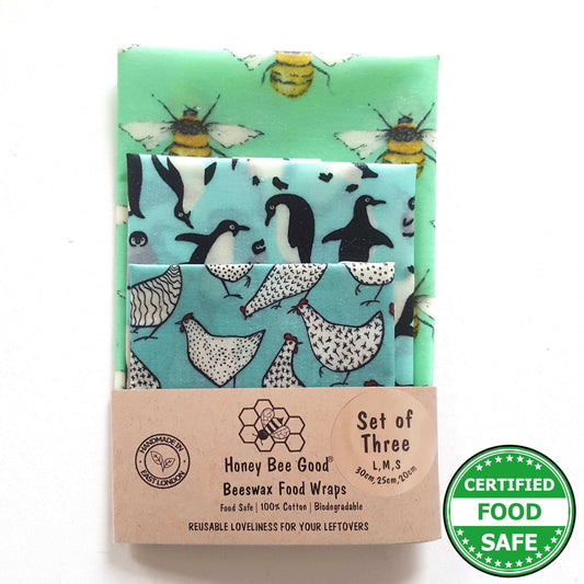 Reusable Beeswax Food Wraps 100% Hand Made in the UK by Honey Bee Good shown in Set of 3 Classic Penguins, Hens & Bees