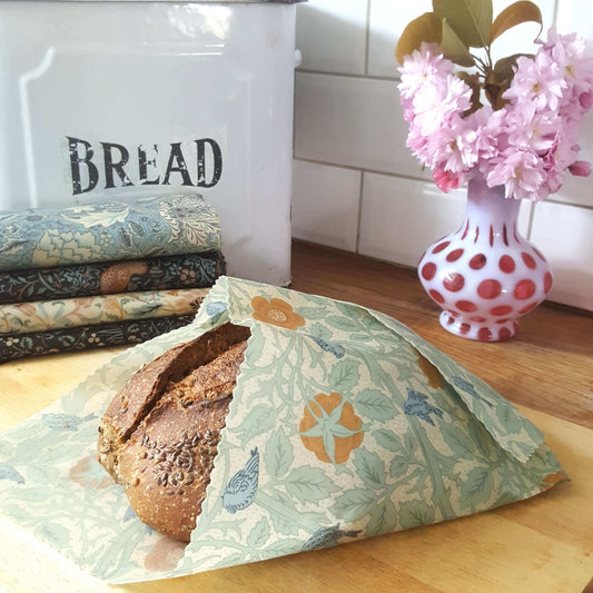 Organic GOTS Cotton Beeswax Bread Wrap in William Morris Tom Tit on bread
